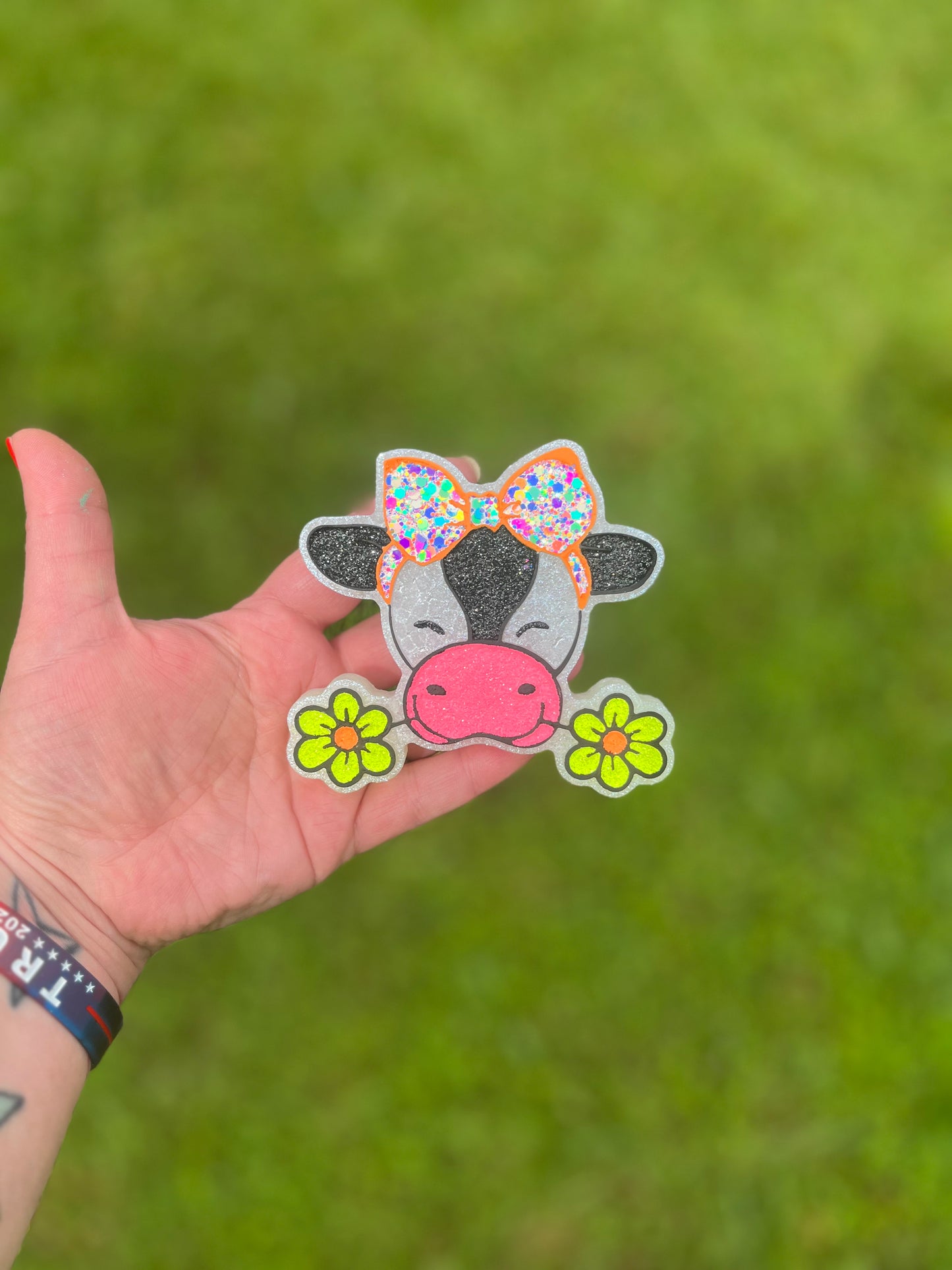 Cow with bow and flowers