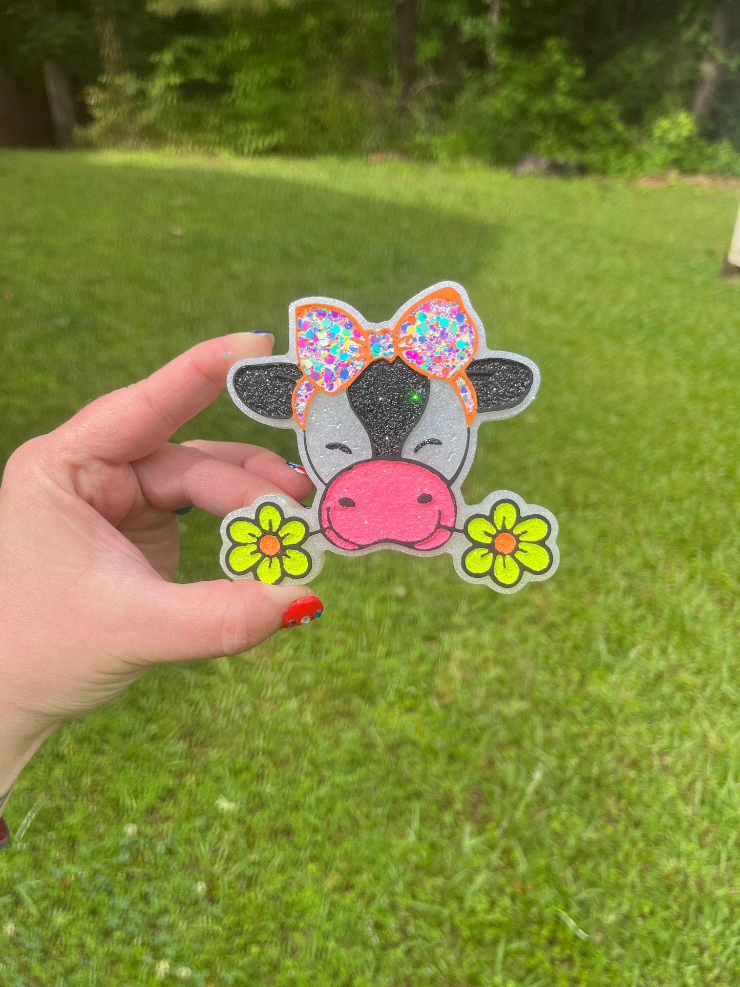Cow with bow and flowers